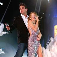 Také společný duet s Kylie Minogue Kids slavil mezinárodní úspěch. Robbie byl do australské krásky údajně zamilovaný