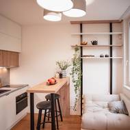 Obývací pokoj je spojený s kuchyňským koutem